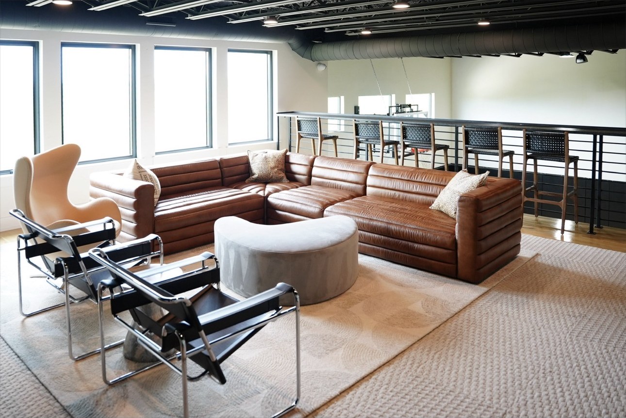 Leather sectional lounge overlooking the athletic level